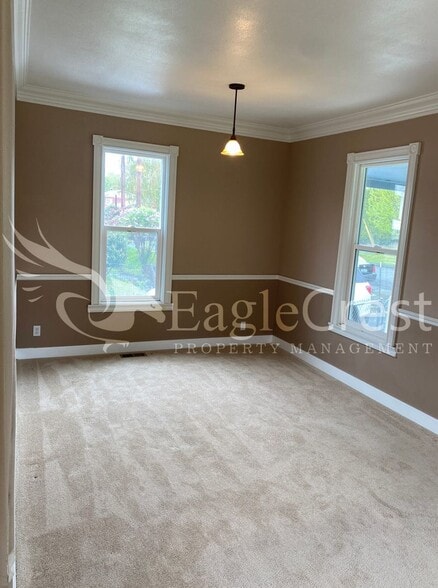 Building Photo - Charming 2 Bedroom Home With 1 Car Garage and A Covered Porch