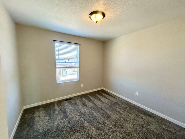Building Photo - Impressive 4 Bedroom Townhome Nestled in M...