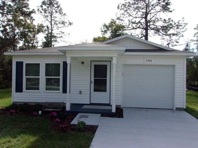Building Photo - Cute Home Ready for Family