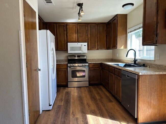 Building Photo - Charming Redding Home with Fireplace & Vau...