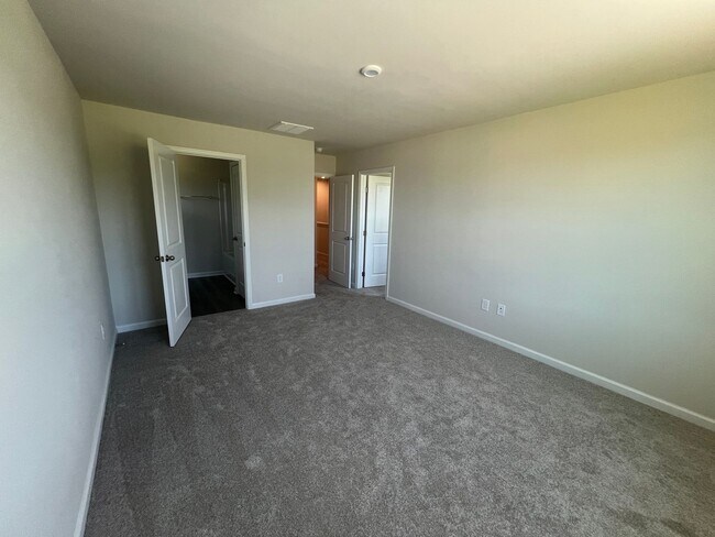 Building Photo - New Three-Bedroom, Two and one-half Bath T...