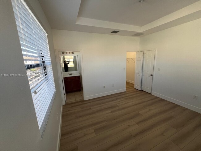 Building Photo - 9399 W 33rd Ln