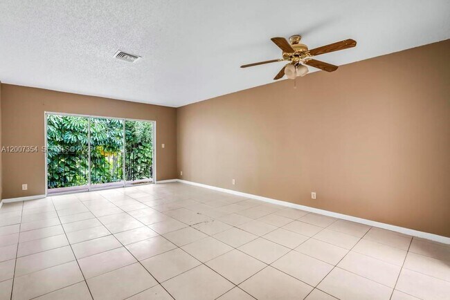 Building Photo - 3100 Coral Springs Dr