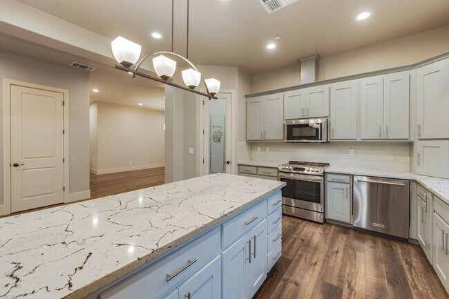 Building Photo - Utilities Included! Luxury Single-Story Ho...