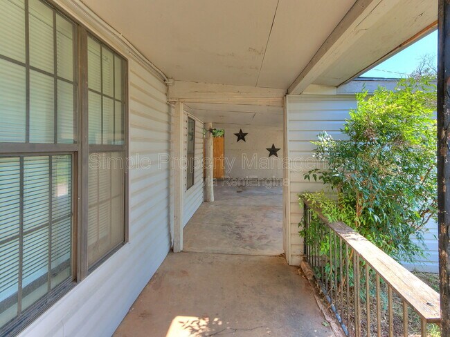 Building Photo - 9706 N Garnett Dr