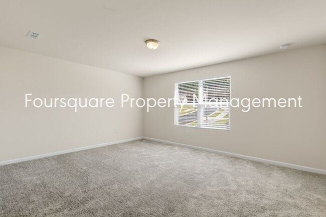 Building Photo - 4 Bedroom Home with 2nd Floor Loft- Kitchen Island & 2-Car Garage – Convenient Raleigh Location