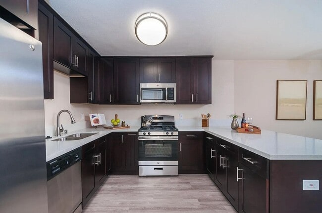 Building Photo - 4 Bedrooms and 2.5 baths!  Modern upgrades...