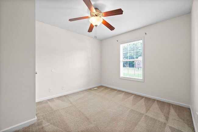 Building Photo - Pet Friendly Three Bedroom with Bonus!