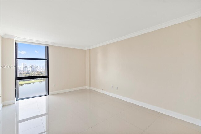 Building Photo - 3675 N Country Club Dr