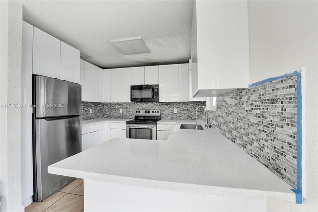 Building Photo - 1154 NW 103rd St