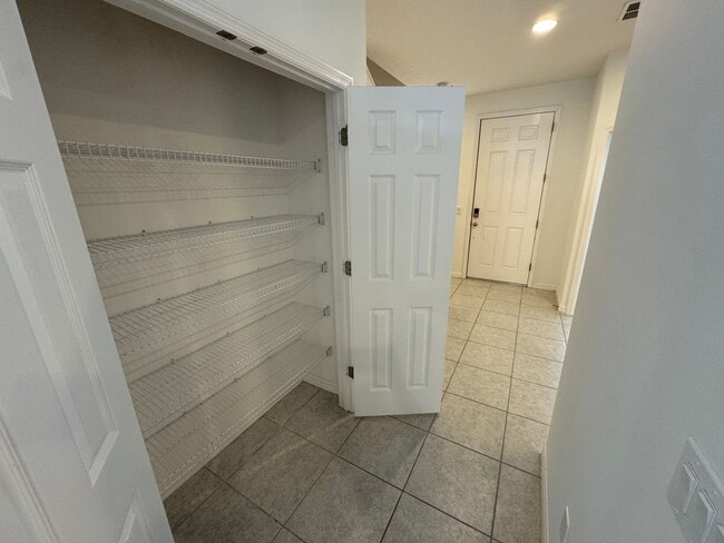Building Photo - Available Now! Spacious 3-Bedroom Townhome with Fenced Yard in Winter Garden – Washer and Dryer I...