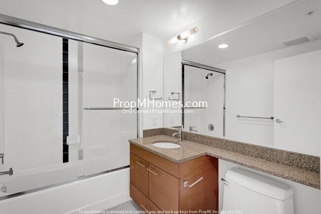 Building Photo - Modern 2-Bedroom, 2-Bath Condo with Stunni...