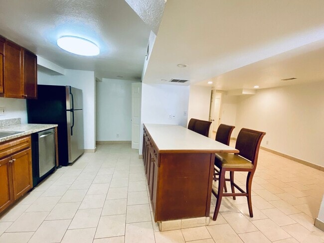 Building Photo - {5639} Spacious Ranch + Two Separate Living Quarters + Fenced Yard!