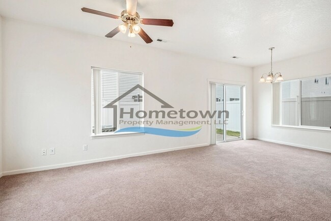 Building Photo - Townhouse Style Home with 3 Bedrooms, 2.5 Bathrooms, and a 2-Car Attached Garage Available in Coe...