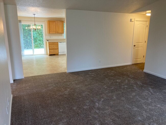 Building Photo - Three Bedroom Home, Landscaping Included!