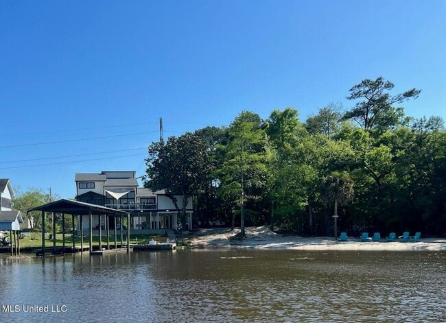 Building Photo - Riverfront Living with Private Boat Launch