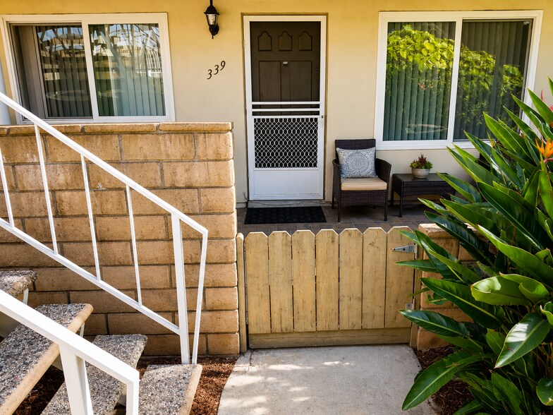 Welcoming front entry with gated patio area and convenient access to the unit. - 339 E Taft Ave