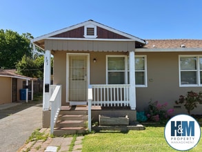 Building Photo - 2 Bedroom Home with Spacious Backyard