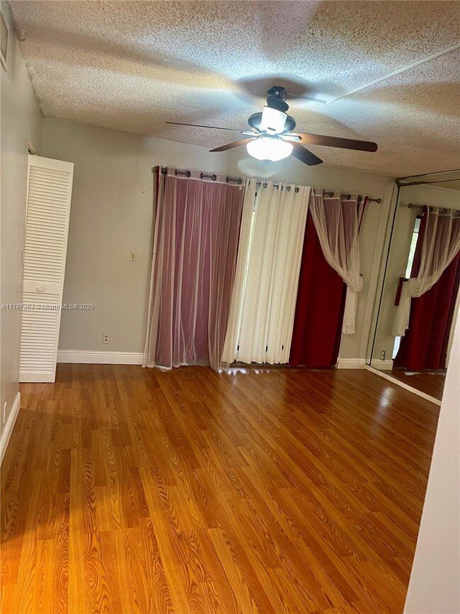 Building Photo - 6695 Racquet Club Dr