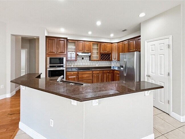 Building Photo - Waterfront 4 Bedroom Home in Eagle Creek Golf Community – Lake Nona