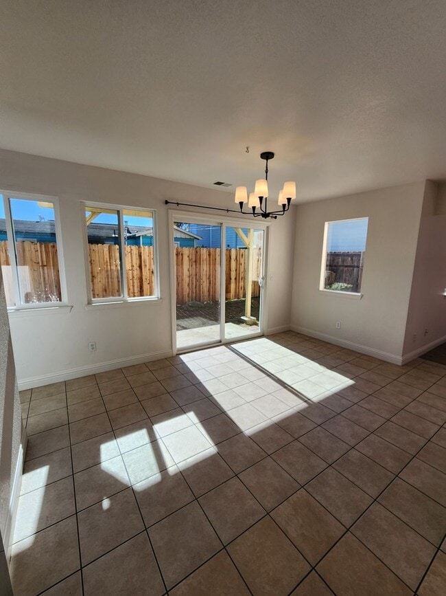 Building Photo - Bright Two-Story 3BR Home Near the Beach with Private Yard