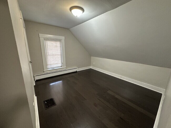 Building Photo - Bright & Spacious 3BR Second-Floor Apartment with 2-Story Living in Rochester!