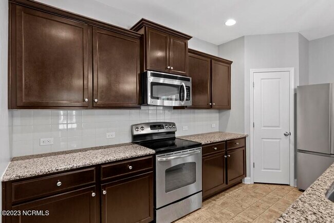 Building Photo - 303 Vilas Way S