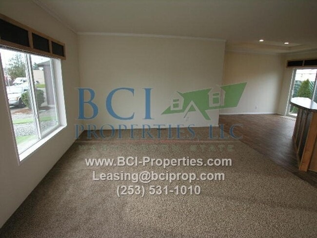 Building Photo - Welcome Home to Evergreen Place Condominiu...