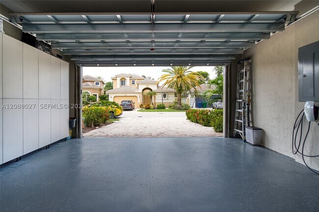 Building Photo - 5875 NW 123rd Ave