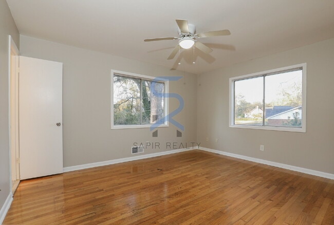 Building Photo - Move in before February 15th and choose your reward: a $250 Amazon Gift Card or a 55" Smart TV!