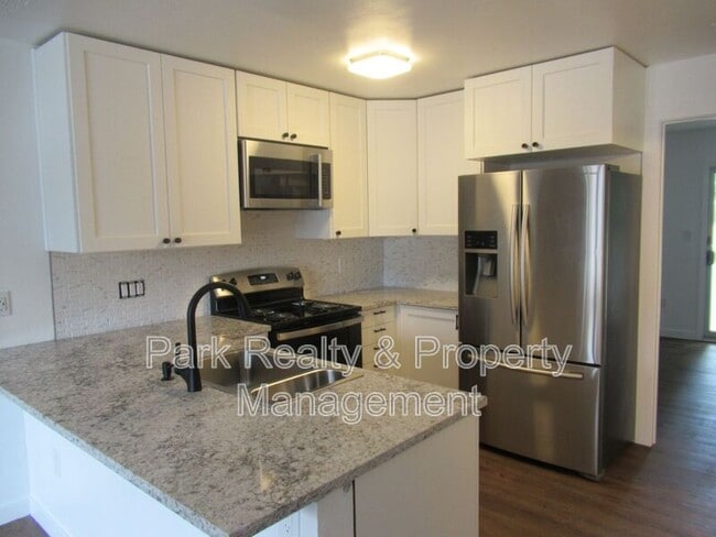Building Photo - 9617 W Chatfield Ave