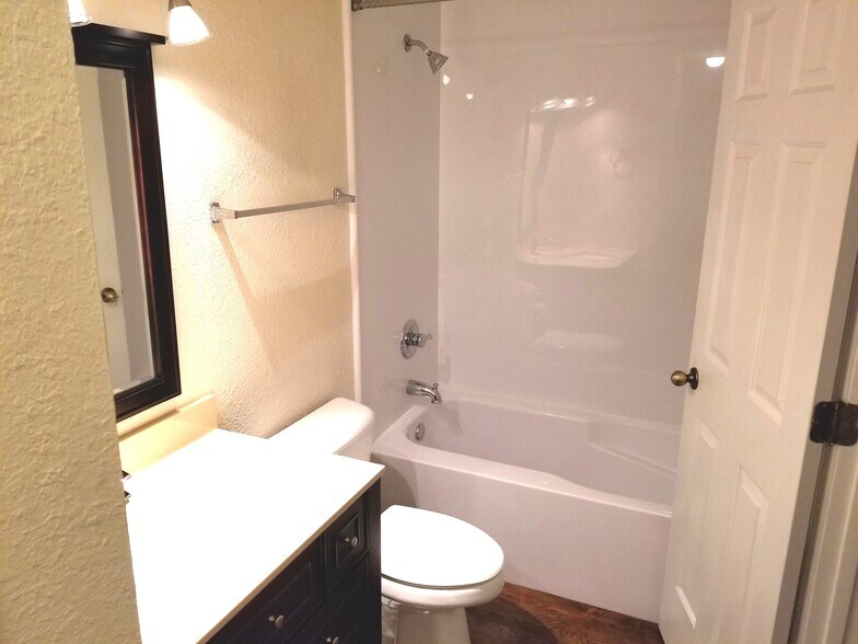 Full bathroom with tub and shower. - 304 N Front St