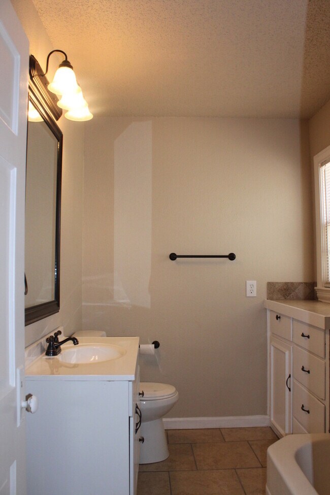 Building Photo - PRE -LEASING FOR AUGUST ! Spacious 4 Bedroom/2 Bath House
