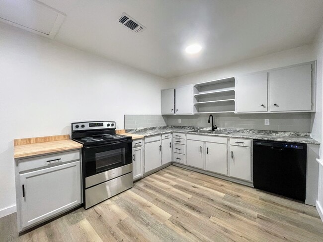 Building Photo - Snyder’s Sweet Spot: Modern Comfort Meets Country Charm