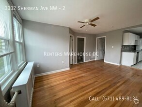 Building Photo - Updated 1BR+Den w/ private patio in heart ...