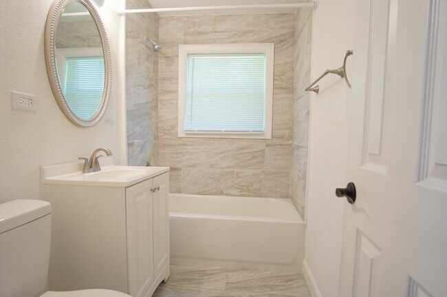 Building Photo - 4BR Home with LVP Flooring, Open Layout & Large Backyard Near Dogwood