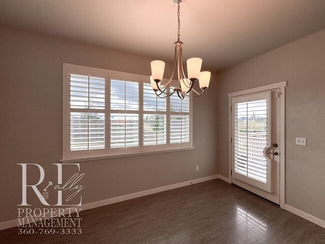 Building Photo - Vaulted Ceilings, Tree-Lined Views & a Spacious Primary Suite Retreat