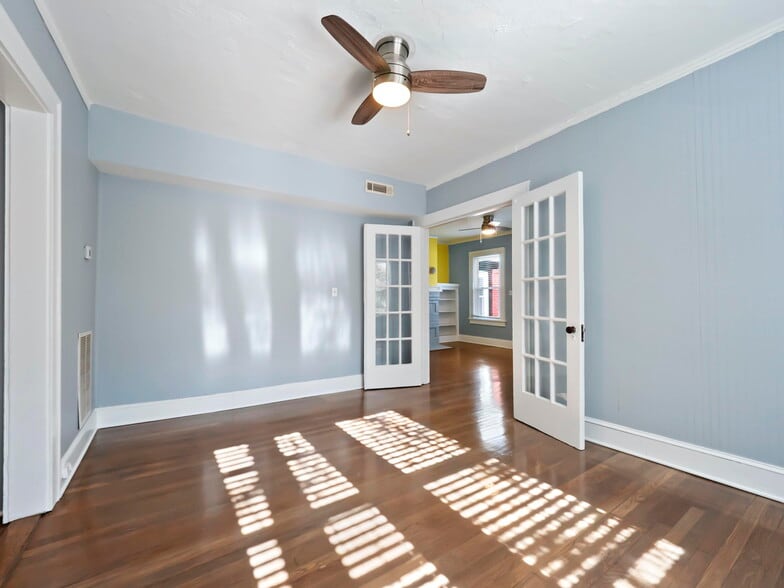 Spacious Bedroom connects to living room and kitchen area - 810 Monroe Dr NE