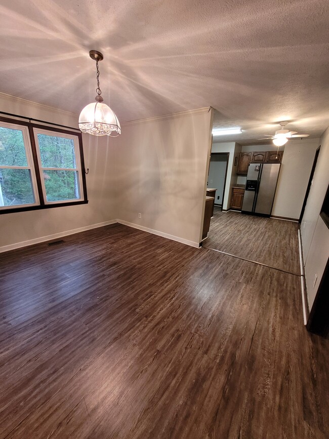 View from front door - dining room and kitchen - 109 Wheeler Ct