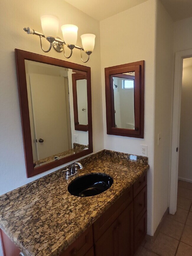 Building Photo - "Charming 3-Bedroom Oasis with 2 Baths in ...