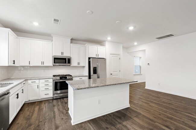 Building Photo - Chic End-Unit Townhome in Forestville Station!