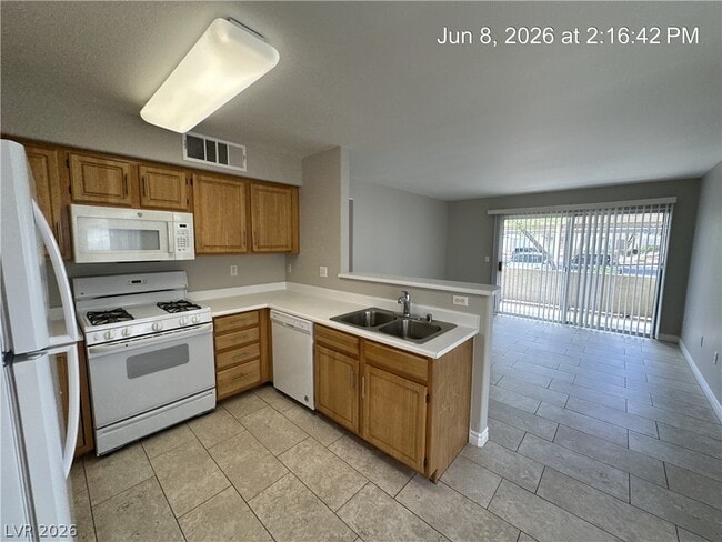 Building Photo - 5710 E Tropicana Ave