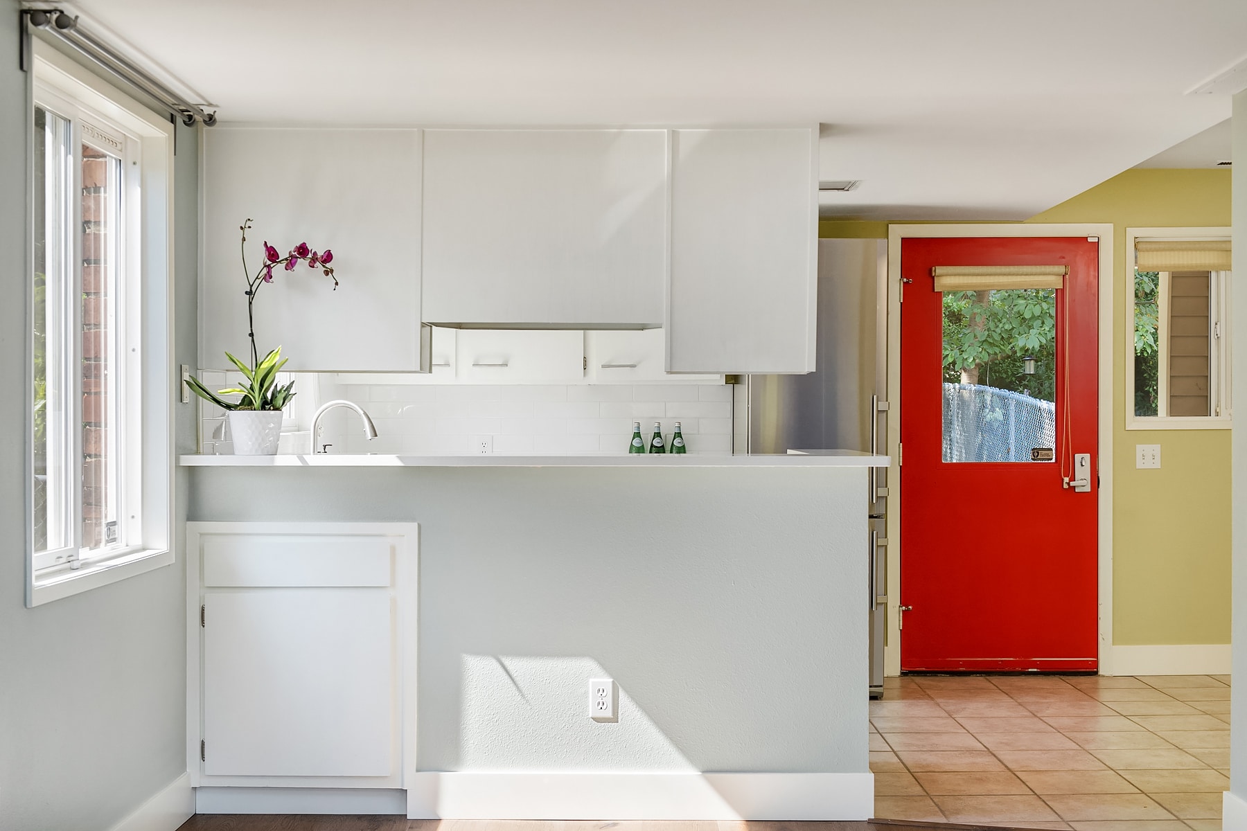 Freshly painted from top to bottom in designer colors carefully chosen. - 7051 8th Ave NW