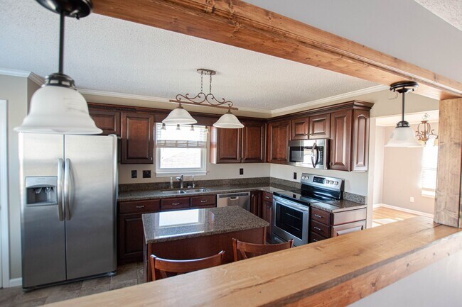 Building Photo - Pet Friendly Four Bedroom with Basement!