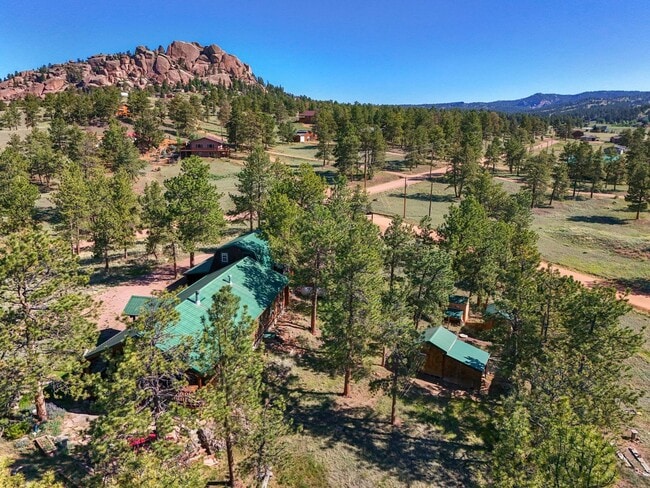 Building Photo - 3 bed 2 Bath Log Home on 2 Acres in Florissant