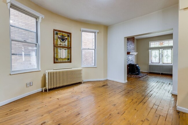 Building Photo - AVAILABLE June 2026 - Beautiful 4 Bedroom, 2 Bath Home w/ Front Porch Swing!