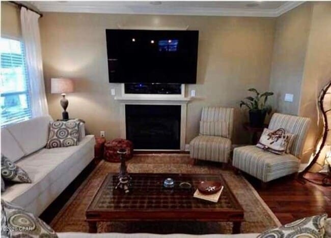 Building Photo - WATERFRONT W/BOAT SLIP!!!! This beautiful home is located in a gated community on North Lagoon Dr...