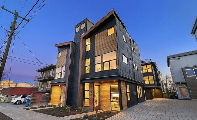 Building Photo - "Charming 3-Bedroom Gem in Seattle's Vibrant Heart - 1733 Sq. Ft. of Modern Comfort!"