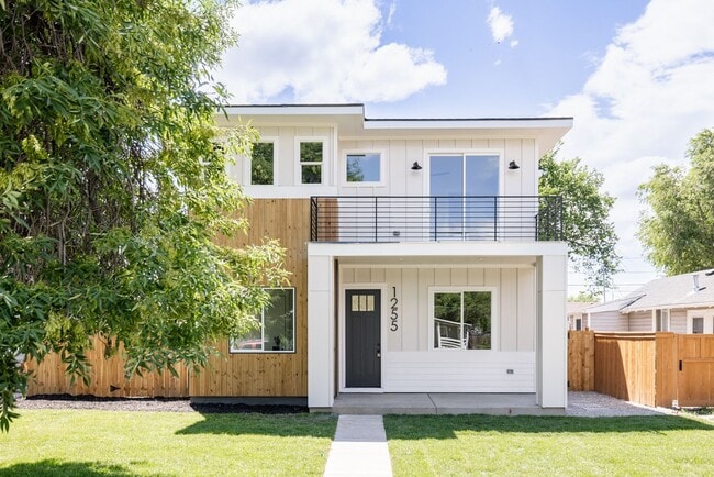 Primary Photo - Modern 4BD, 3BA Home with 2-Car Garage and...