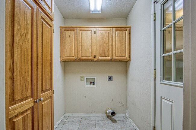 Building Photo - This beautiful home is located in a quiet private neighborhood and perfect for a serene living at...